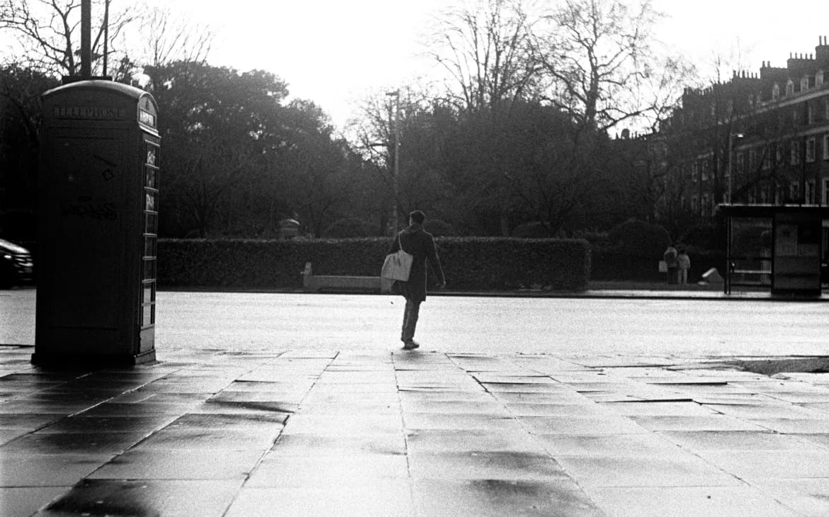 Film Photography London: 10 Spots for Street Shots, Vinyl & Hidden Gems | Alfie B-Smith Quiet moments between the chaos. A classic phone box and long shadows in the winter sun.