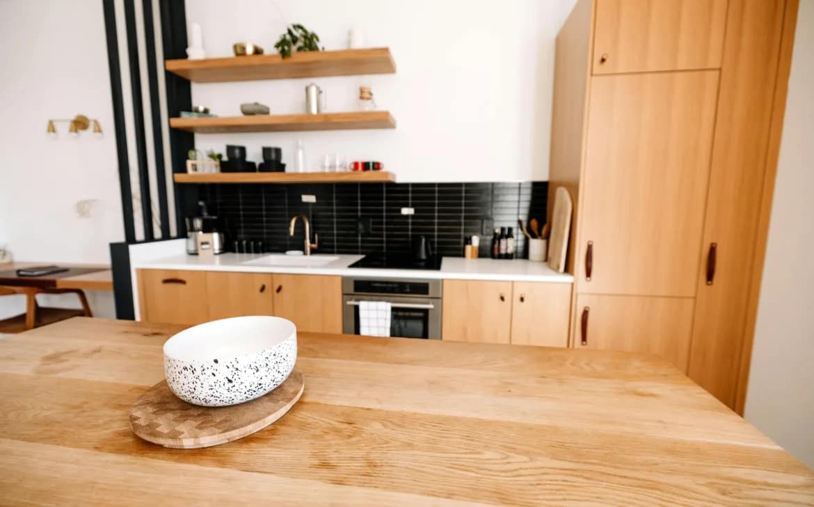 7 Essential Kitchen Decluttering Tips for a Tidy Space | Alfie B-Smith Kitchen decluttering zones showing prep and cooking areas.